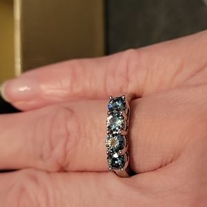 4 light blue stone ring
